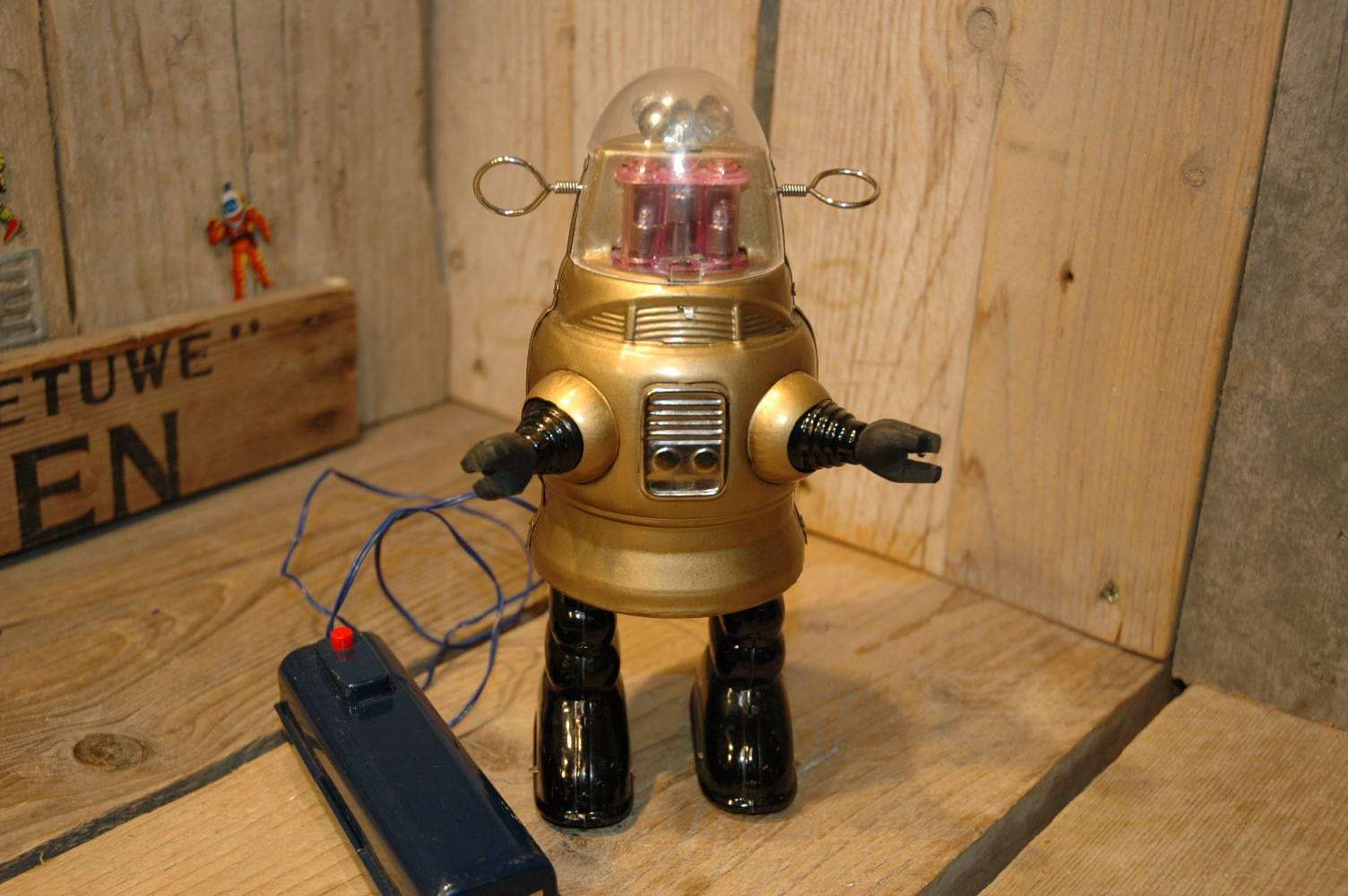 Nomura - Golden Pug Robby Robot with Black legs and straight antenna